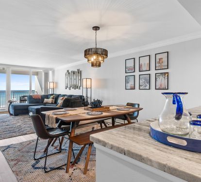 Step into your bright, oceanfront living space where modern comfort meets coastal elegance, complete with stunning sea views from your private balcony.
