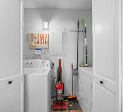 Your dedicated laundry closet keeps cleaning convenient with full washer, dryer, and storage for all your vacation essentials.