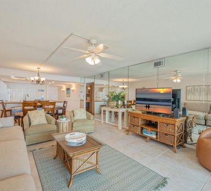 Relax in your spacious coastal retreat with ocean-inspired décor, comfortable seating, and an open layout perfect for gathering with loved ones.