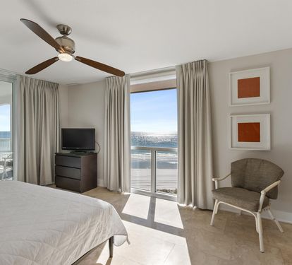 Wake up to stunning ocean views from your serene bedroom, where gentle sea breezes and natural light create the perfect coastal retreat.