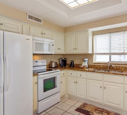 Your fully equipped kitchen awaits with modern appliances, granite countertops, and everything you need to create memorable meals.