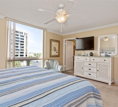 Rest comfortably in your coastal bedroom with crisp linens, entertainment center, and peaceful city views from your window.