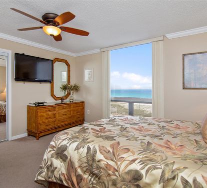 Wake up to stunning ocean views from your tropical bedroom retreat, where gentle sea breezes flow through while you relax.