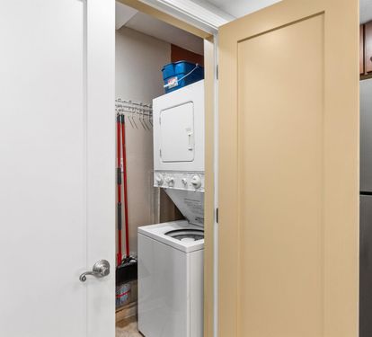 Your in-unit laundry closet features stacked washer and dryer with convenient storage space for all your cleaning supplies.
