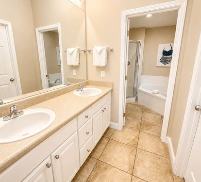 Lighthouse 1710 Primary Bathroom with Dual Sinks