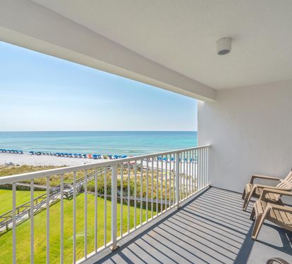 Step onto your private balcony and soak in breathtaking ocean views while relaxing in comfortable seating overlooking pristine beaches.