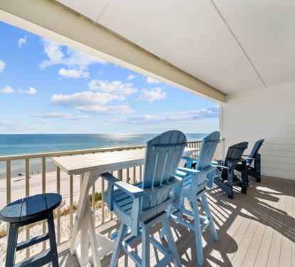 Relax on your private balcony with stunning ocean views. Comfortable seating awaits while you sip morning coffee or watch the sunset over pristine beaches.