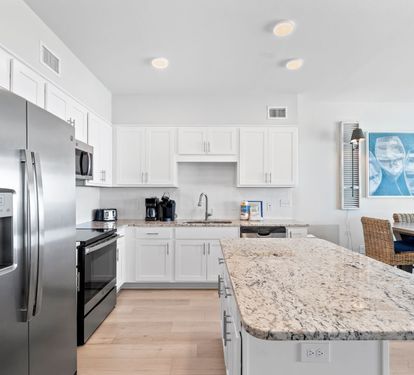 Your fully equipped kitchen features granite countertops, stainless steel appliances, and everything you need to create memorable meals during your stay.