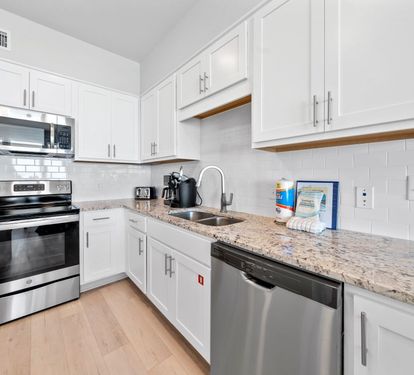 Your fully equipped kitchen features granite counters, stainless appliances, and everything you need to create delicious meals during your stay.