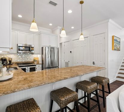 Ample Counter Space + Bar Seating for 4