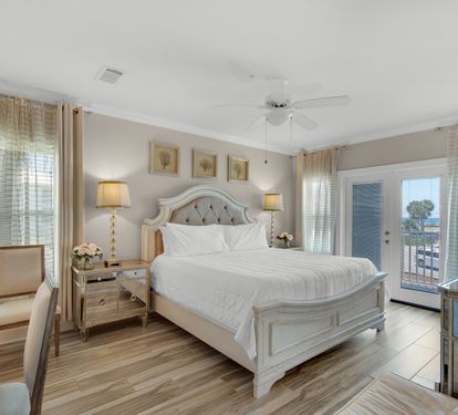 Primary Bedroom with King Bed and Balcony Access