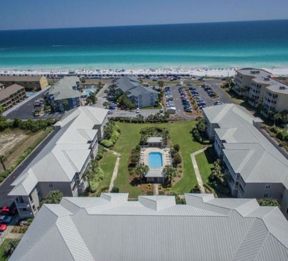 Just steps from the shore, this stunning condo offers the ideal blend of convenience and tropical beauty