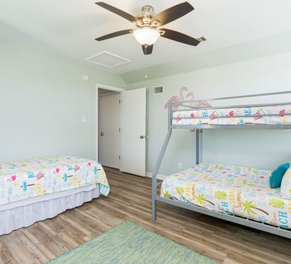 Wanderlust Bedroom 3 with Twin + Twin-over-Full Bunk Bed