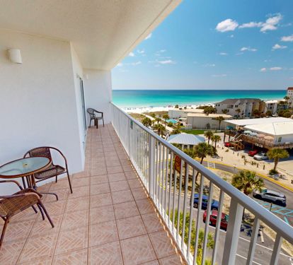 Elevated coastal property located near the beach, offering access to the surrounding area's turquoise waters and white sand from this position in the building.