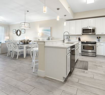 Your bright, open-concept kitchen and dining space invites you to gather, cook, and share meals, all while soaking in the coastal light and comfortable, modern finishes that make this home feel effortlessly yours.
