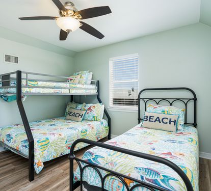 Blue Lagoon Bedroom 3 with Twin + Twin-over-Full Bunk Bed