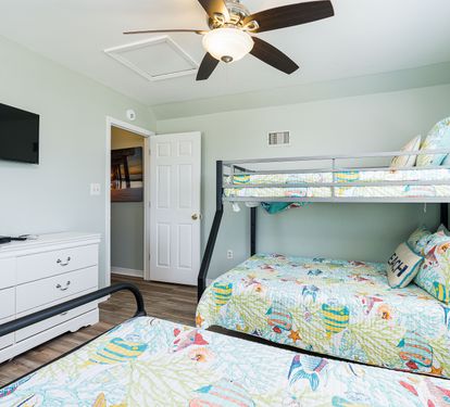 Blue Lagoon Bedroom 3 with Twin + Twin-over-Full Bunk Bed