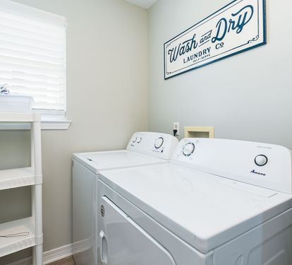 Blue Lagoon Laundry Room with Full Size Washer + Dryer
