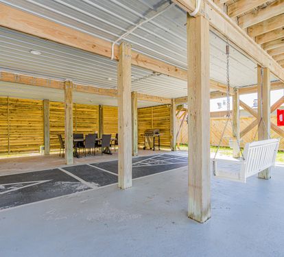 Blue Lagoon Shuffleboard + Covered Swing