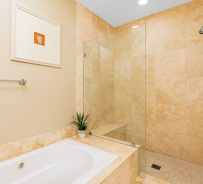 Wharf 713 Primary Bathroom with Soaking Tub and Separate Shower