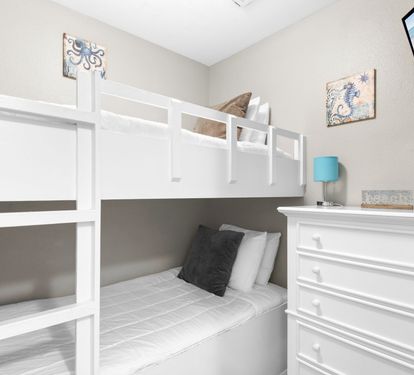 Rest easy in your bright bunk room, a perfect space for the younger ones to chill out.