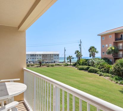 Step onto your private balcony and take in the ocean glimpses beyond the lush tropical landscaping. Settle into your seat and enjoy coastal breezes, listening to the waves crashing on the sugar sand beach.