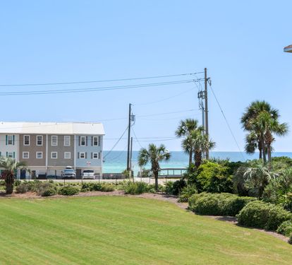 Enjoy your views of the sparkling turquoise Gulf waters between swaying palms and lush tropical landscaping—close enough to hear the waves.