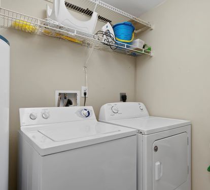 Crystal Tower 1101 Laundry with Full Size Washer Dryer