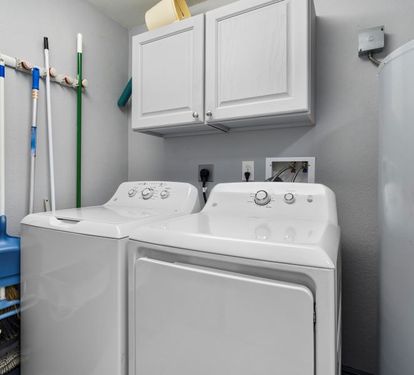 Crystal Tower 709 Laundry Room with Full Size Washer Dryer