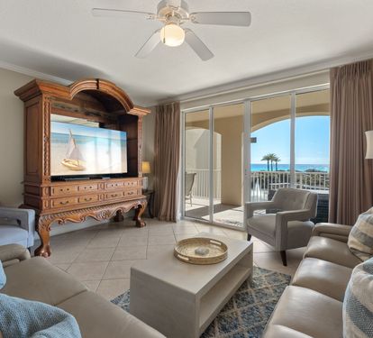 Relax in this elegant living room with ocean views from the private balcony.