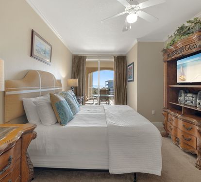 Sink into crisp white linens in your coastal bedroom, where ocean breezes flow through and nautical touches create a perfect seaside retreat.