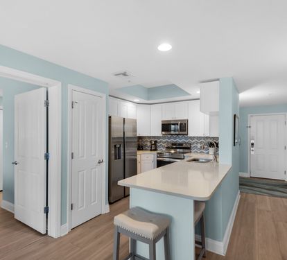 Updated Open Kitchen with Stainless Steel Appliances