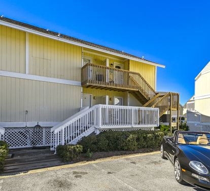 Stairs leading up to second floor unit. No elevator