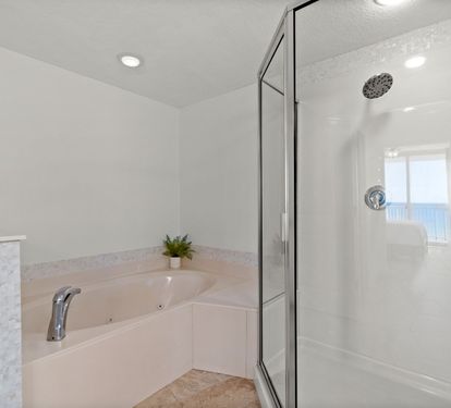 Primary King En-Suite - Soaking Tub + Walk-In Shower