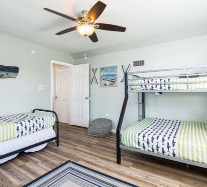 Endless Summer Bedroom 3 with Twin + Twin-over-Full Bunk Bed