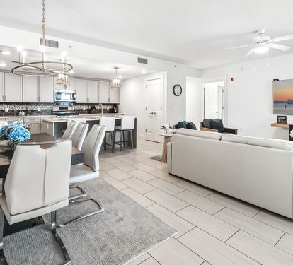 Step into your bright, modern retreat where sleek finishes and open living create the perfect backdrop for memorable evenings together.
