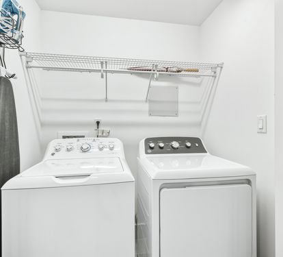 Your dedicated laundry room keeps your clothes fresh with full-size washer and dryer, plus convenient storage for all your essentials.