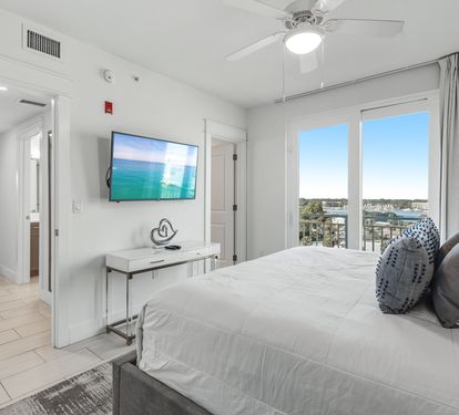 Wake up to stunning waterfront views from your comfortable king bed, with modern amenities and a peaceful retreat atmosphere.