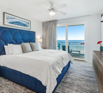 Wake up to stunning ocean views from your cozy king bed. Soft linens and coastal decor create the perfect beach retreat.
