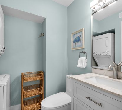 Half Bath off Primary Bedroom and Laundry Center