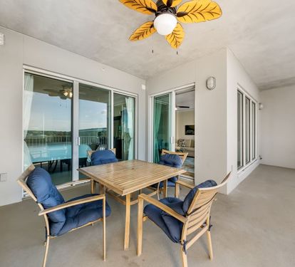 Wharf 521 Outdoor Dining Table on Balcony Seats 4