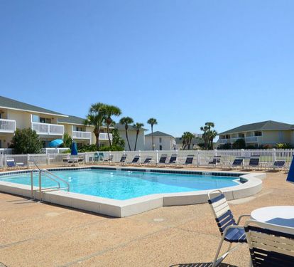 One of five sparkling community pools at Sandpiper Cove Resort, offering a refreshing place to cool off, relax poolside, and enjoy sunny Destin days in a peaceful resort setting.