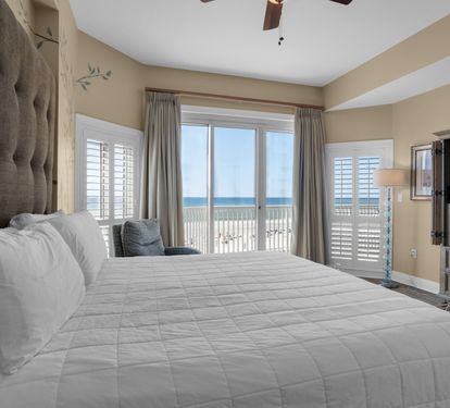 Primary Bedroom with King Bed and Flat Screen TV