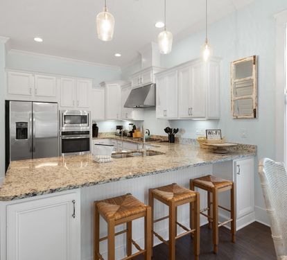 Step into your bright, modern kitchen where granite counters and stainless appliances await your culinary adventures.