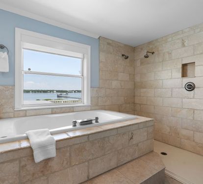 Laguna Beach Daze Primary Bathroom with Soaking Tub and Large Step-in Shower