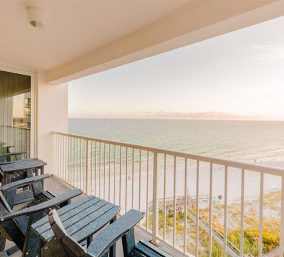 Unwind on your private balcony with stunning ocean views and comfortable seating for peaceful mornings and magical sunset evenings.