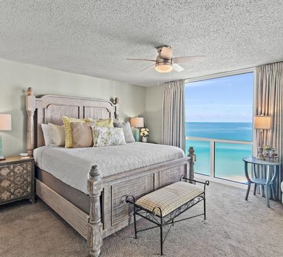 Wake up to breathtaking ocean views from your comfortable bed, where soft linens and coastal breezes create the perfect seaside retreat.
