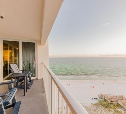 Unwind on your private beachfront balcony with breathtaking ocean views, complete with comfortable seating for morning coffee or sunset cocktails.