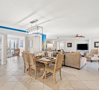 Step into your bright, open living space where coastal elegance meets comfort—perfect for gathering with loved ones.
