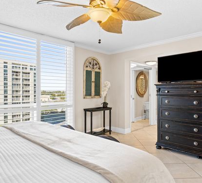 Wake up to stunning city views from your comfortable bedroom, complete with elegant furnishings and modern entertainment center for ultimate relaxation.